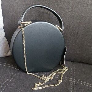 Black Round Crossbody Bag with Gold Chain